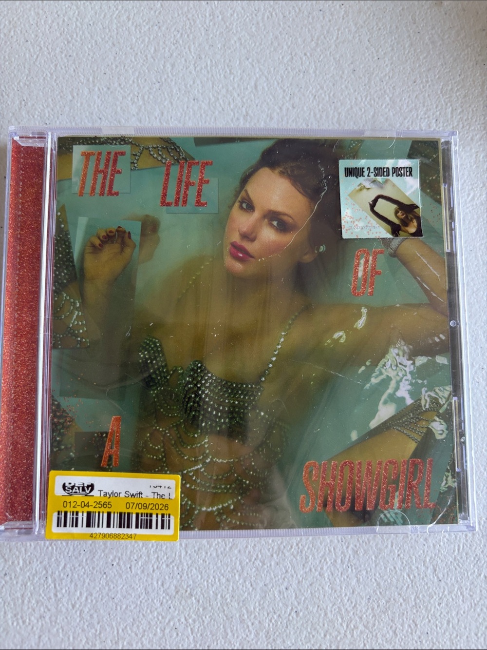 Taylor Swift Aqua Cover with Red Glitter Text